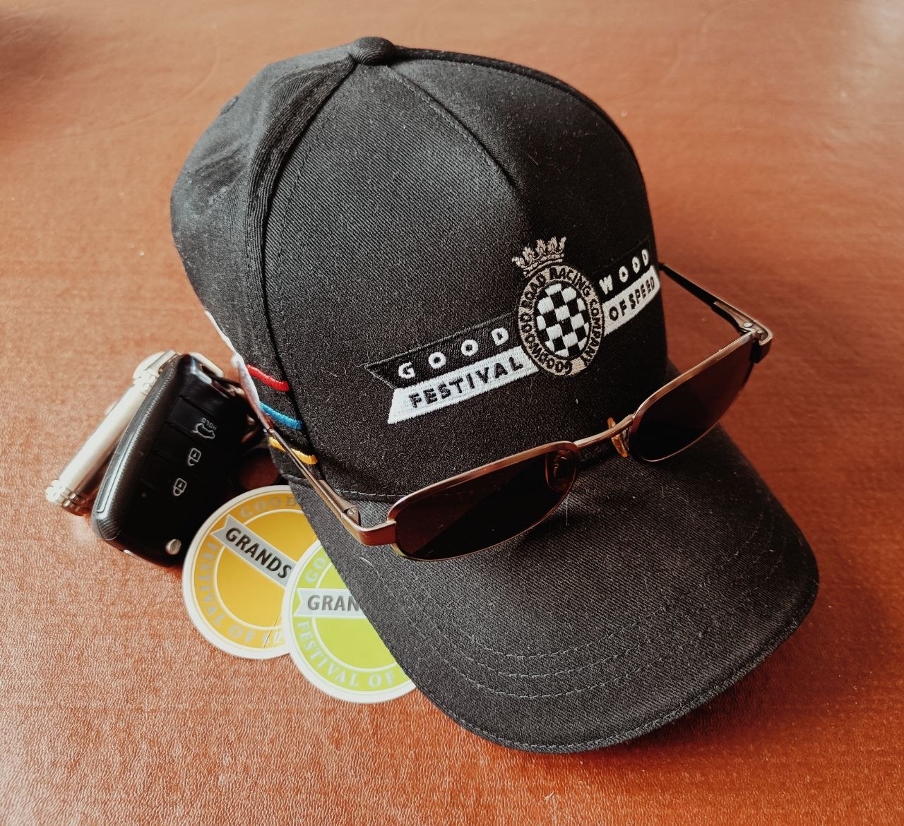 Goodwood cap and sunglasses